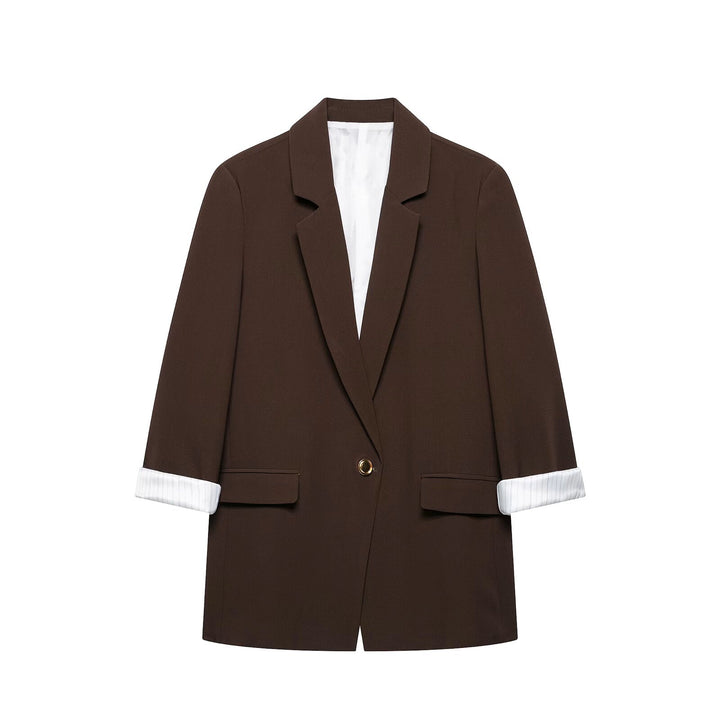 Women's tailored long blazer with cuffed sleeves and decorative button Mune Fashion