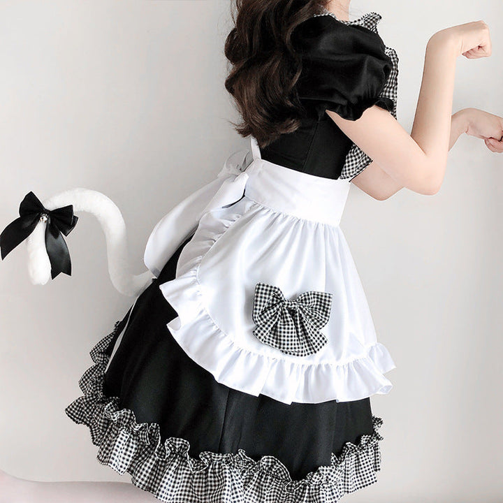 Ladies playful maid dress with ruffle details and bows Mune Fashion