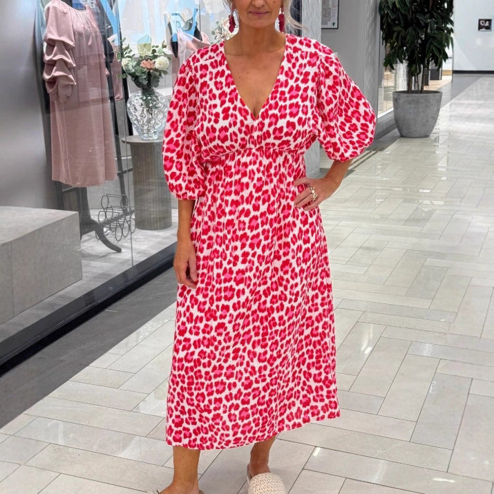 Women's maxi dress with deep V-neck, voluminous puff sleeves, and smocked waist seam Mune Fashion