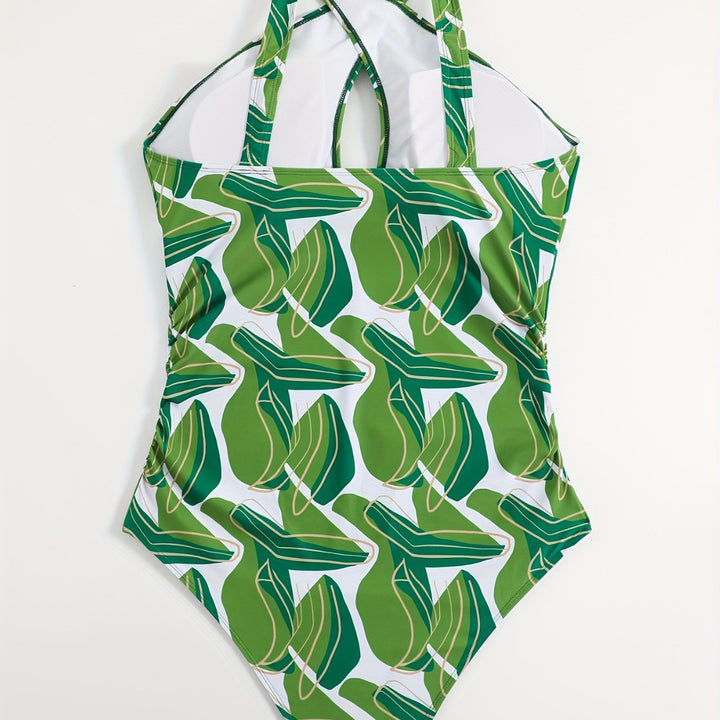 Women's one-piece swimsuit with modern cut and green leaf pattern Mune Fashion