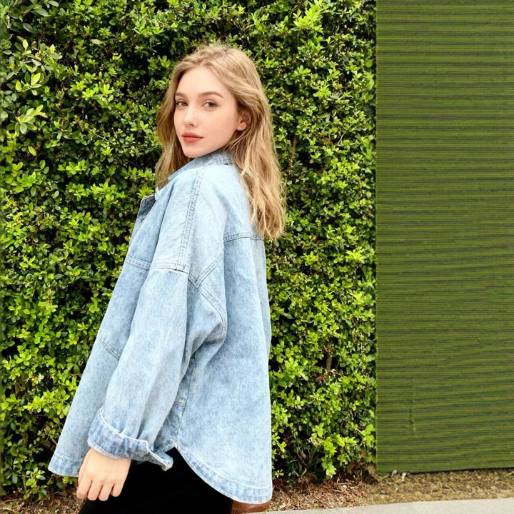 Women's oversized denim shirt with patch chest pockets, lightweight cotton denim, and rounded hem Mune Fashion