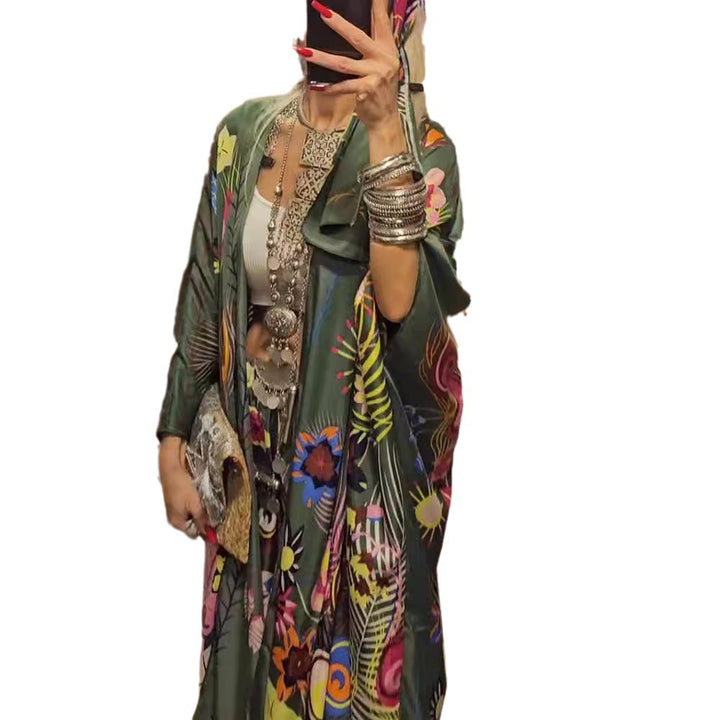 Women's extravagant maxi kaftan two-piece set with wide kimono sleeves, flared palazzo pants, and expressive floral print Mune Fashion