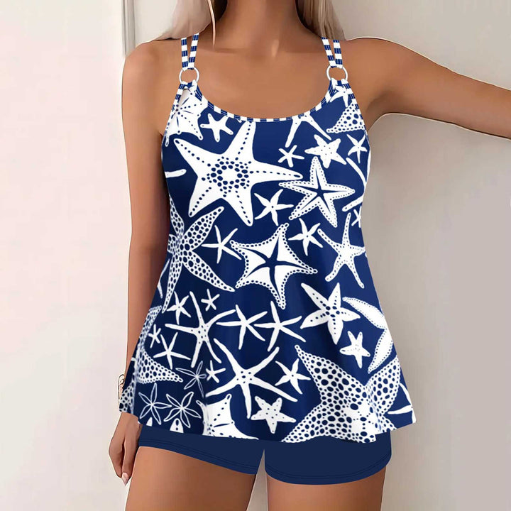 Ladies airy-cut spaghetti strap top with ring detail and A-line cut Mune Fashion