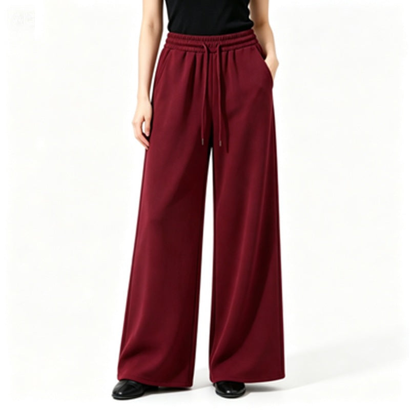 Ladies wide high-waist lounge pants with elastic waistband, drawstring, and flowing jersey Mune Fashion