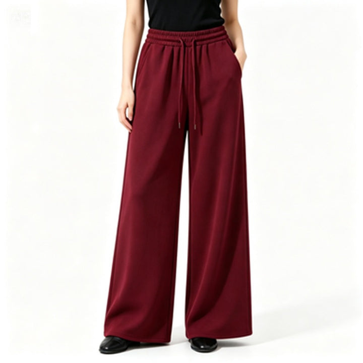 Ladies wide high-waist lounge pants with elastic waistband, drawstring, and flowing jersey Mune Fashion