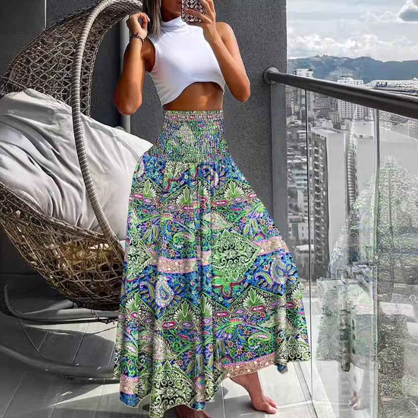 Ladies nan maxi skirt with high smocked waist and flowing boho pleated look Mune Fashion