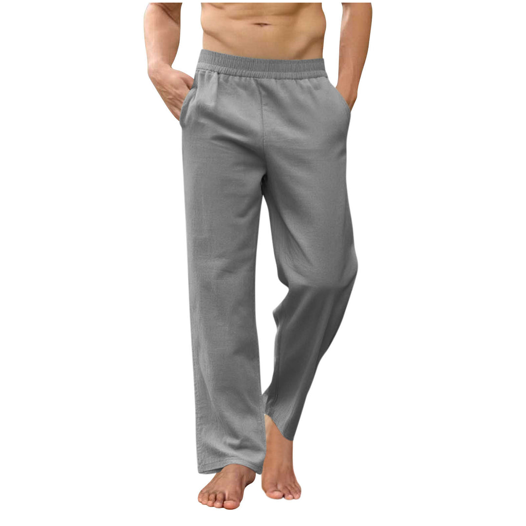 Men's loose lounge pants with elastic waistband, side pockets and side ankle slits Mune Fashion