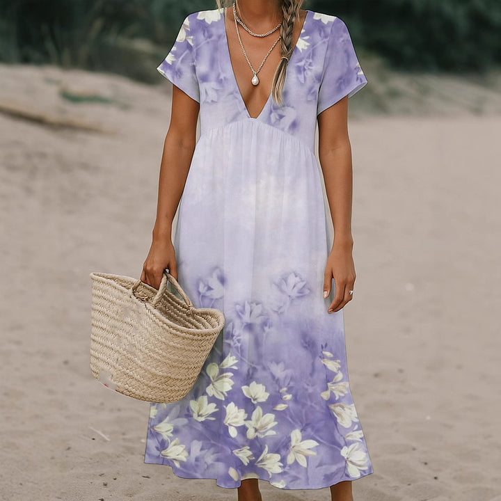 Ladies max dress with deep V-neck and flowing skirt Mune Fashion