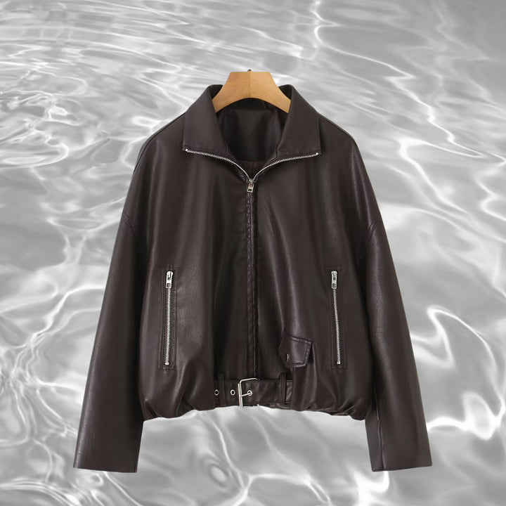 Women’s cropped oversized leather jacket in bomber style with zippered pockets and waist belt Mune Fashion