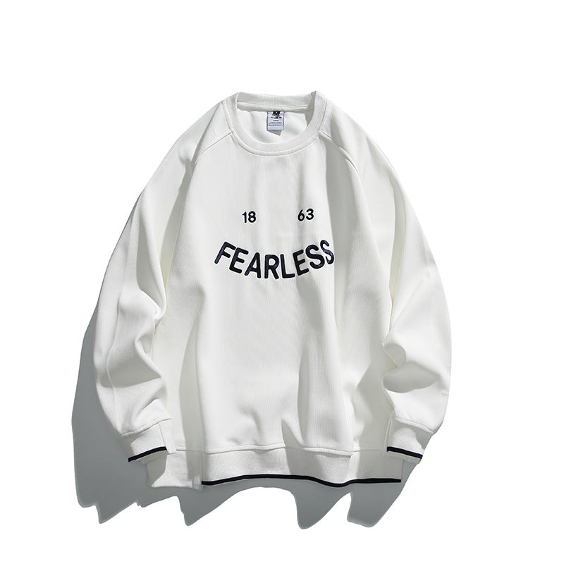 Unisex Oversize Sweatshirt with raglan sleeves and distinctive FEARLESS front print Mune Fashion