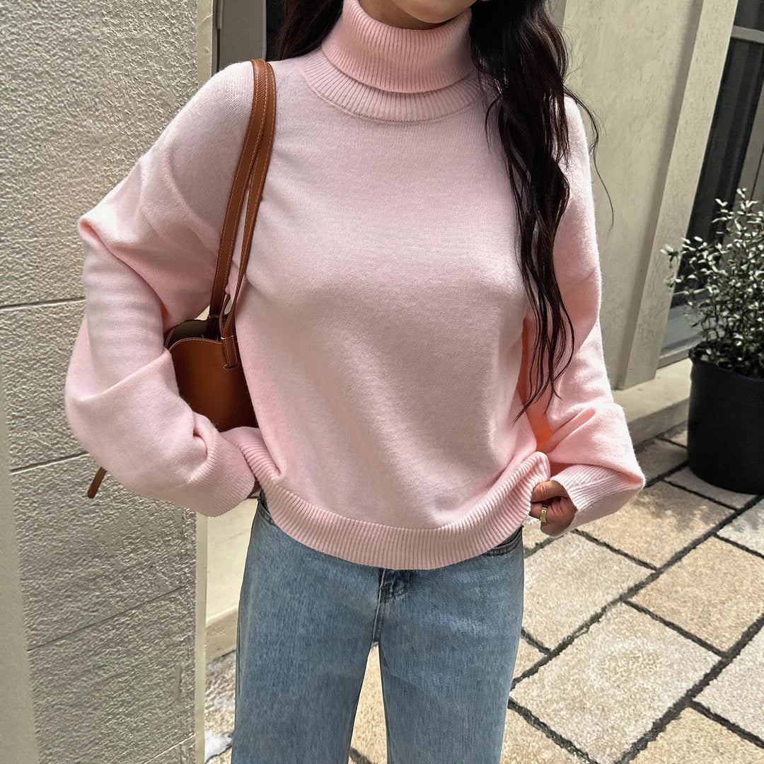 Women's oversized turtleneck sweater with wide ribbed collar, voluminous balloon sleeves, and extended cuffs Mune Fashion