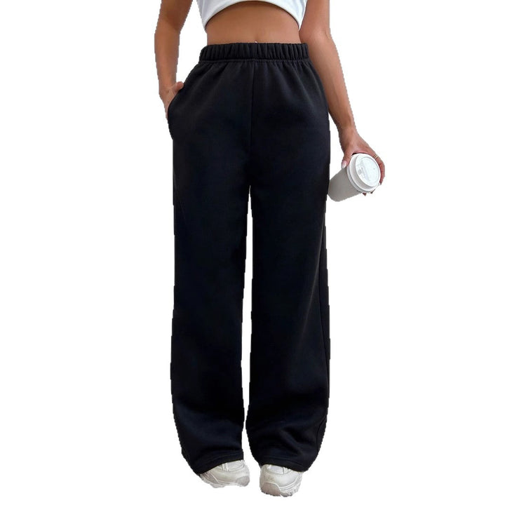 Women high-waisted flared lounge pants with elastic comfort waistband and concealed pockets Mune Fashion