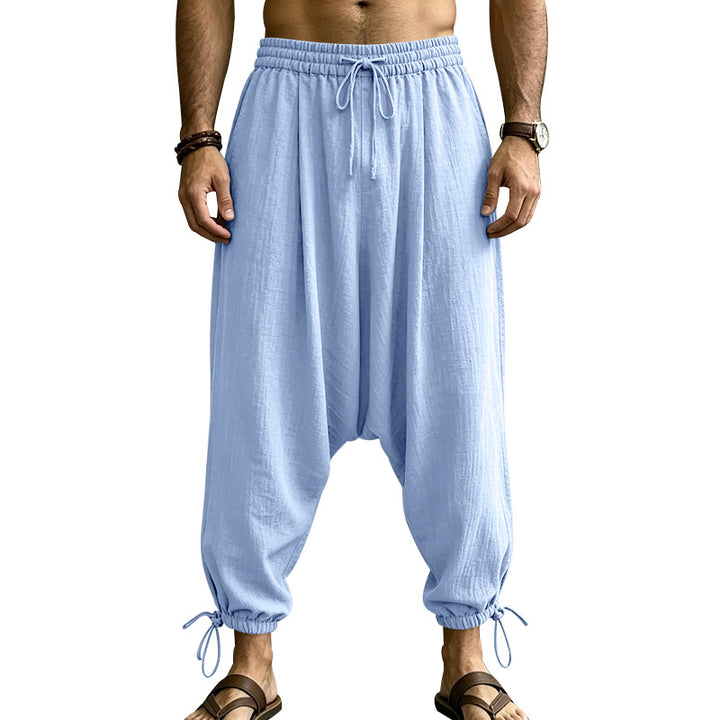 Men's harem pants with a low crotch, elastic waistband, and adjustable ankle cuffs Mune Fashion