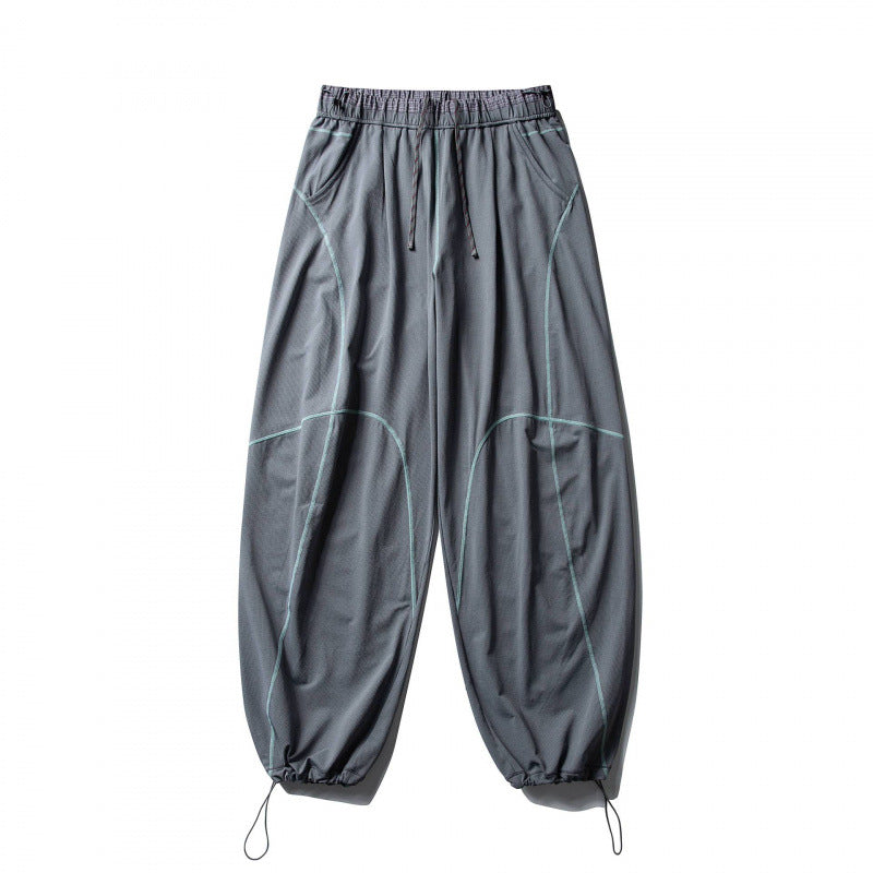 Unisex locker cut tech jogging pants with elastic waistband, distinctive flatlock seams and drawstring Mune Fashion