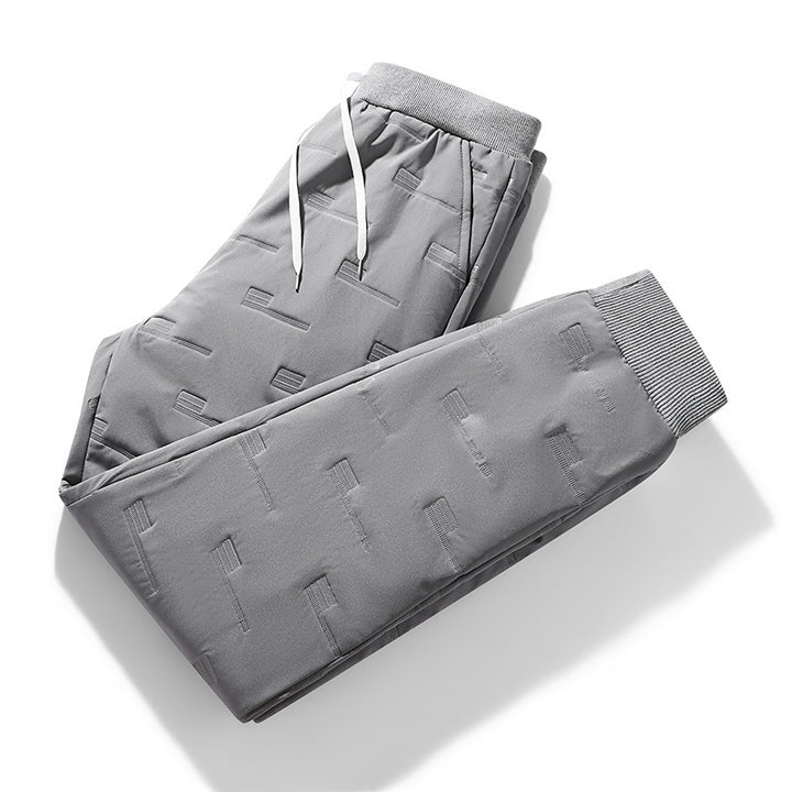 Men's sporty jogging pants with elastic waistband, drawstring, and ribbed cuffs Mune Fashion