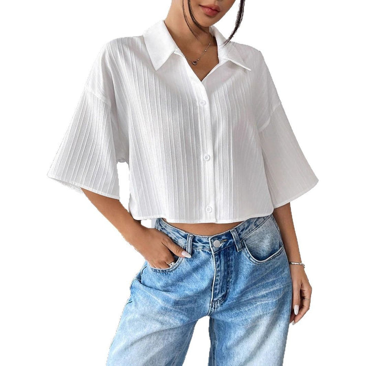 Ladies oversized short blouse with shirt collar and fine pleat structure Mune Fashion