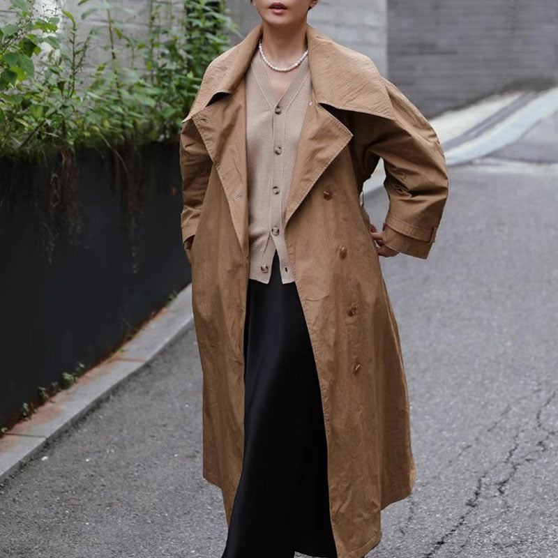 Women's Maxi Length Trench Coat with Oversized Shoulder Yoke, Waist Belt, and Voluminous Sleeves Mune Fashion