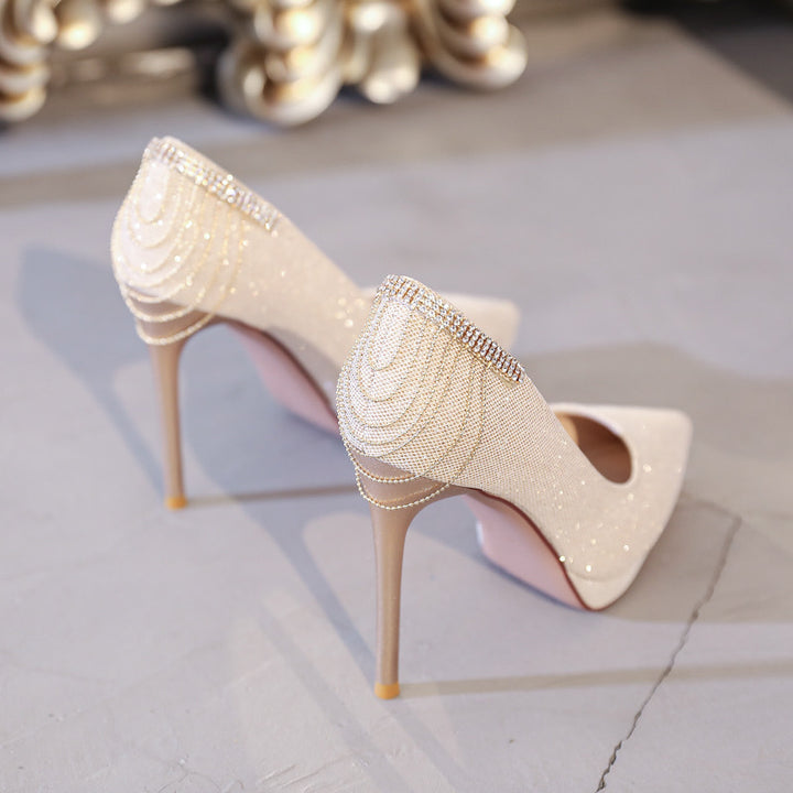 Women's elegant evening pumps with fine glitter mesh, pointed toe, delicate stiletto heel, and decorative heel application Mune Fashion