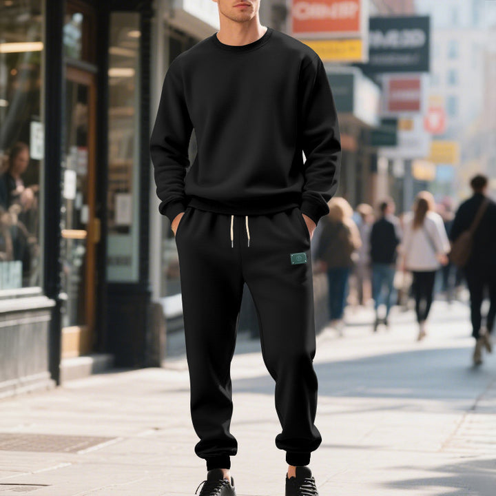 Men's relaxed-fit cotton fleece jogging pants with elastic drawstring, ribbed cuffs, and subtle patch application Mune Fashion