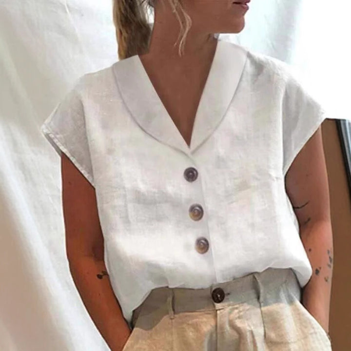Women's airy linen blouse with wide V-neck, dropped shoulder and decorative button placket Mune Fashion