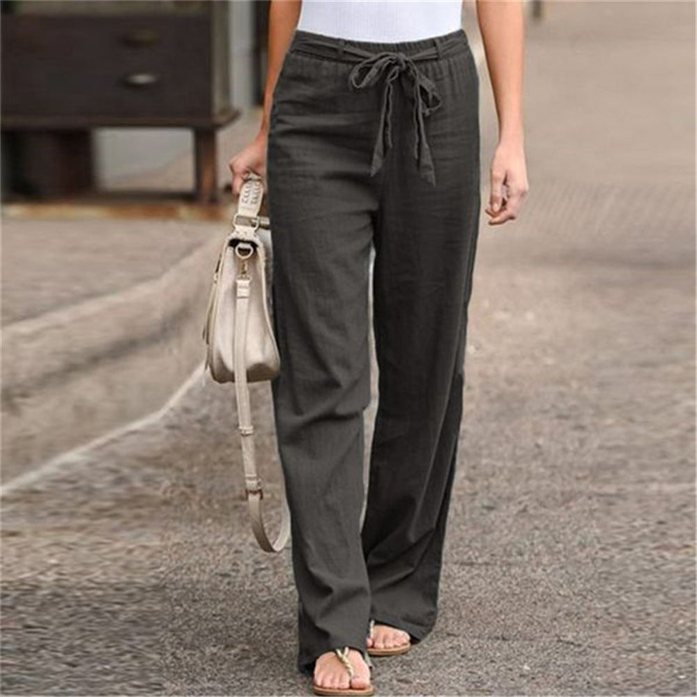 Women's loose linen pants with drawstring waistband, straight leg and side pockets Mune Fashion
