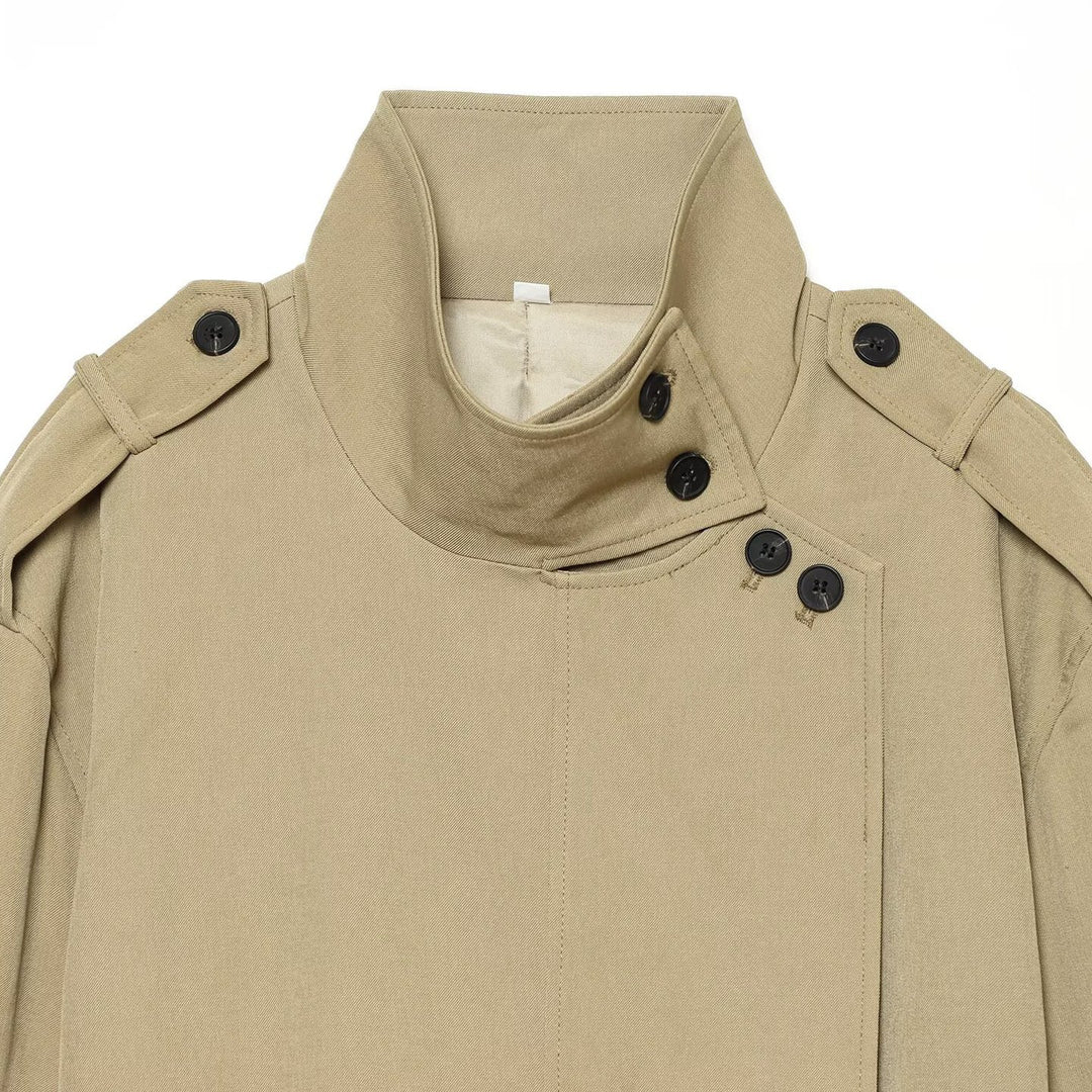 Women's short trench coat in lightweight gabardine style with asymmetrical button closure and tie belt Mune Fashion