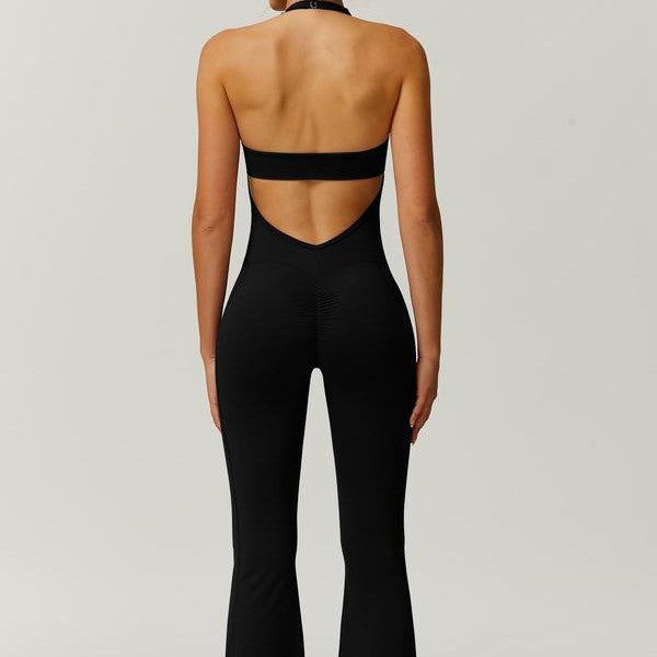 Women's sporty jumpsuit with figure-hugging cut and straps Mune Fashion
