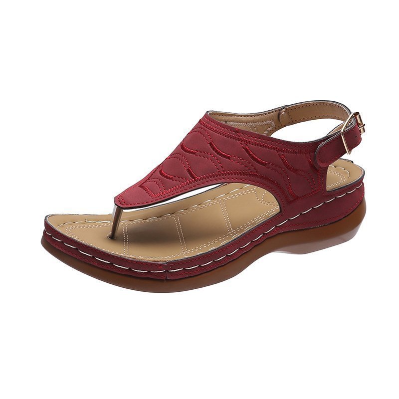 Women’s toe ring sandal with viscoelastic comfort footbed, adjustable heel strap and hand-stitched edge detail Mune Fashion