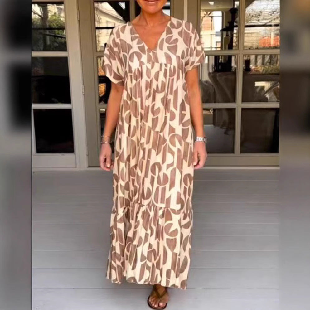 Women's voluminous maxi dress with under-bust seam, V-neck, short kimono sleeves, and tiered ruffle Mune Fashion