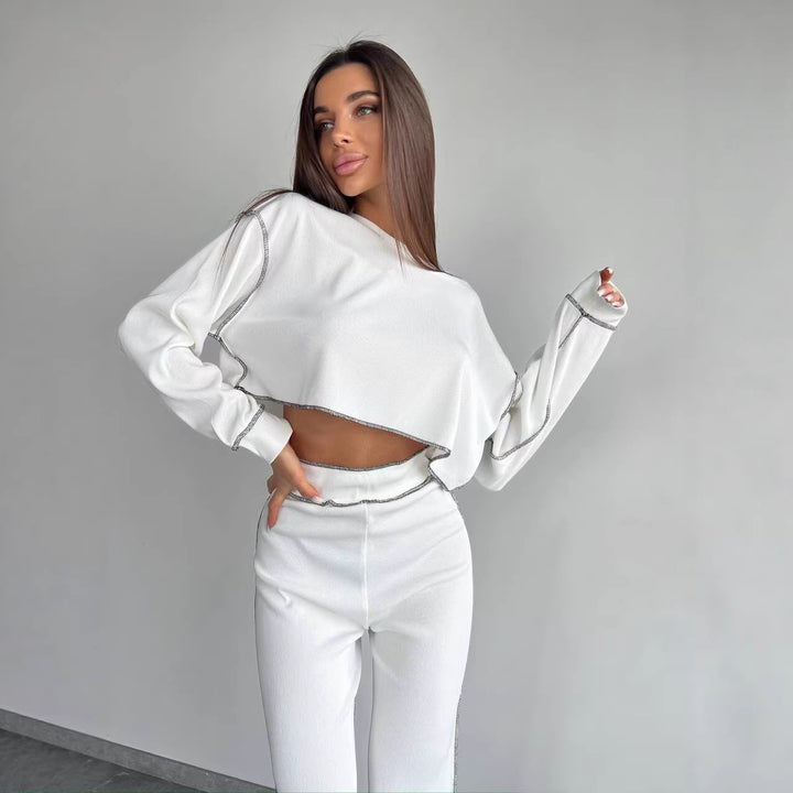 Women Cropped Oversized Sweatshirt with Overlock Seams and High-Waist Flared Pants Set Mune Fashion