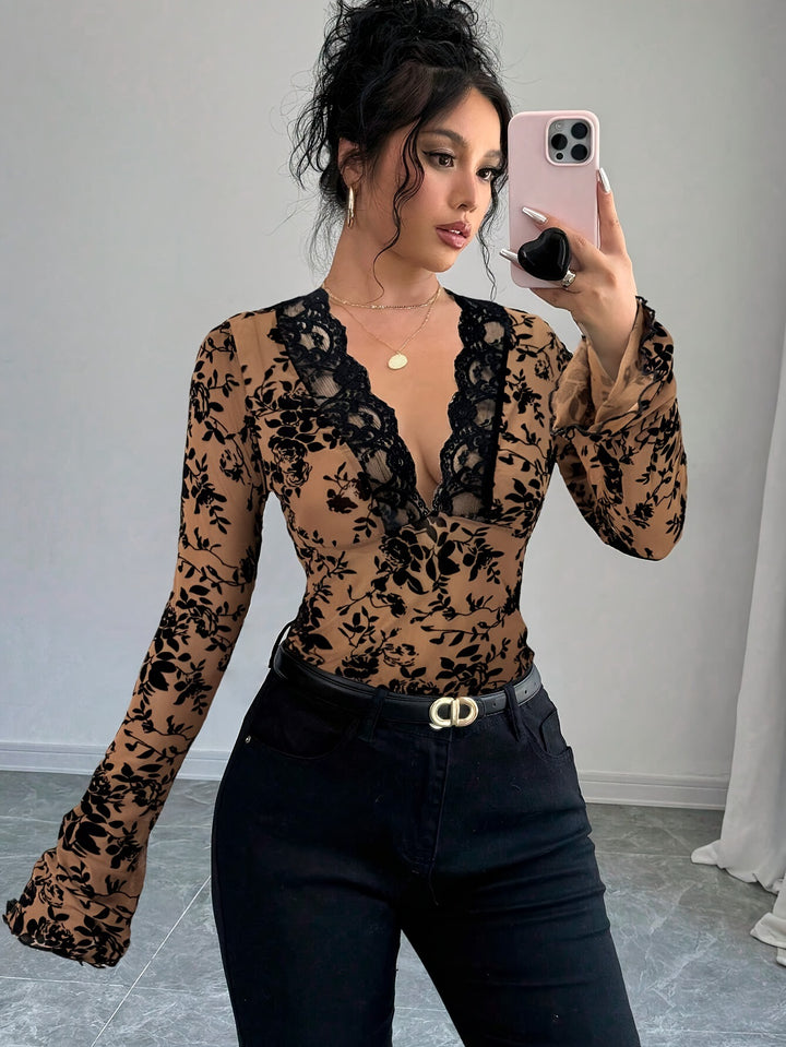 Women's tight-fitting transparent mesh lace blouse with deep V-neck and floral velvet texture Mune Fashion