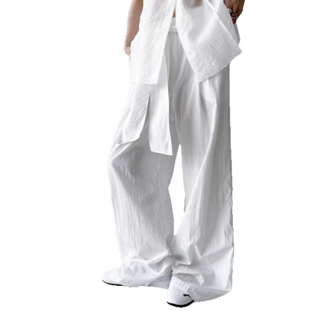 Women's high-waisted linen pants with wide leg and decorative tie belt Mune Fashion