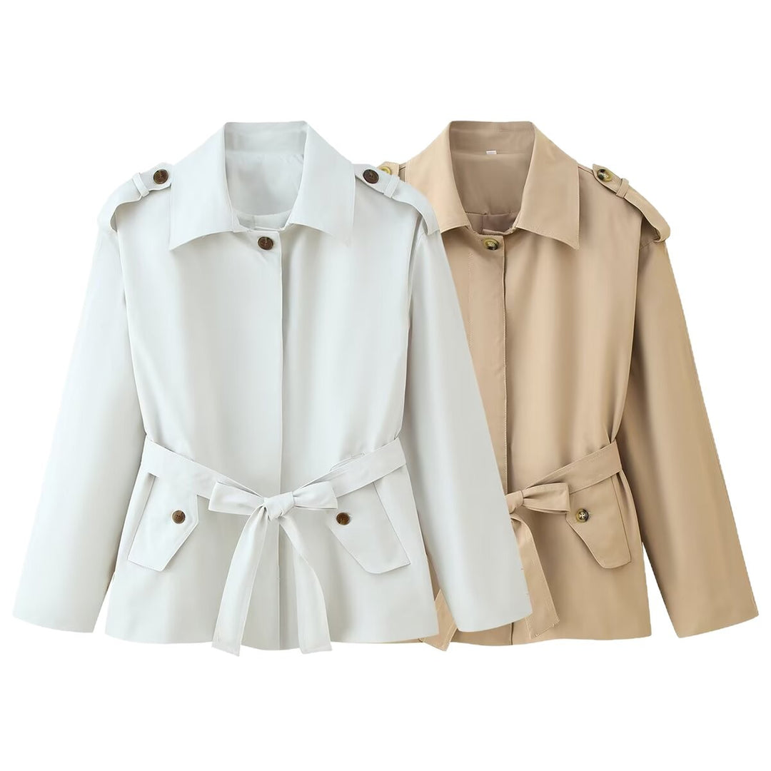 Women's short trench coat with waist belt, shoulder flaps, and patch pockets Mune Fashion