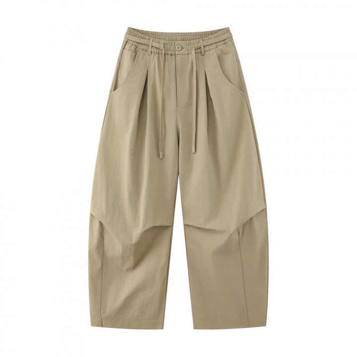 Unisex wide layered pants with balloon-shaped silhouette, high waist and drawstring Mune Fashion