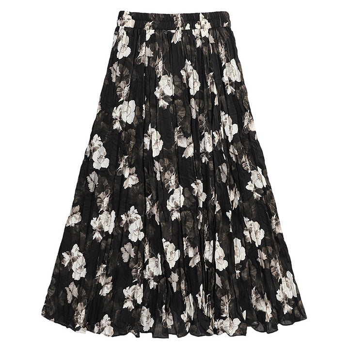 Women's flowing midaxi skirt with asymmetrical wave hem, fine crinkle pleated structure and elastic comfort waistband Mune Fashion