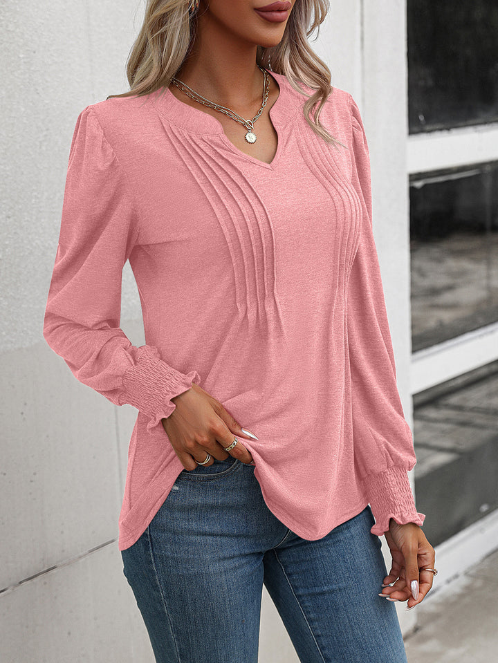 Women's long sleeve shirt with V-neckline, decorative inverted pleats at the front and elastic smocked cuffs Mune Fashion