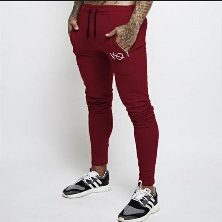 Men's narrow cut jogging pants with elastic waistband and drawstring Mune Fashion