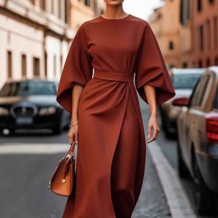 Women's minimalist evening dress with overlong wide sleeves and waist-sculpting pleat draping Mune Fashion