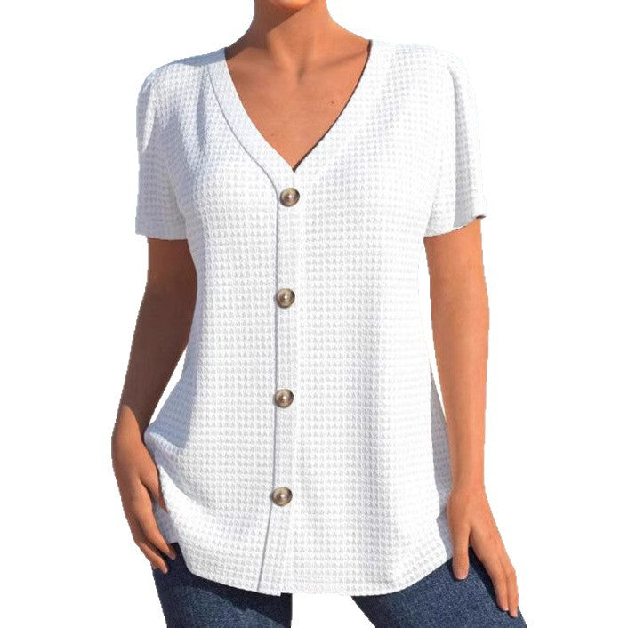 Women's finely structured V-neck top with decorative button placket and slightly flared silhouette Mune Fashion