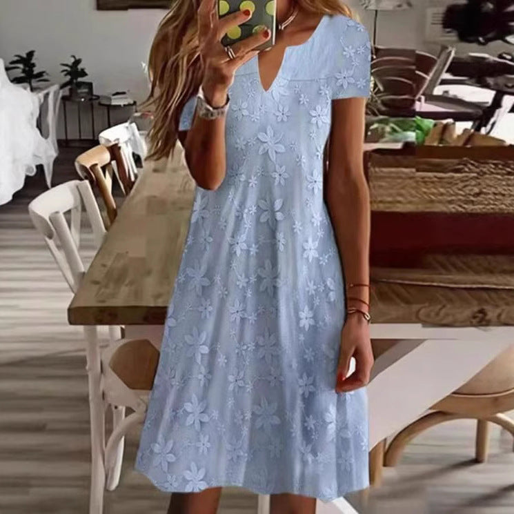 Women's knee-length A-line dress made of cotton blend with embroidered broderie overlay, short sleeves and V-neck Mune Fashion