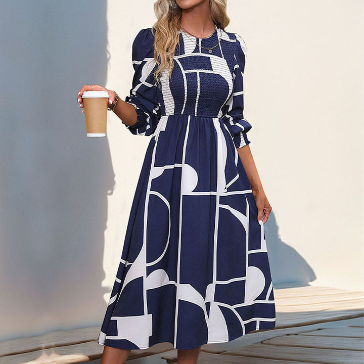 Women's A-line midi dress with smocked bustier, long balloon sleeves, and graphic print Mune Fashion