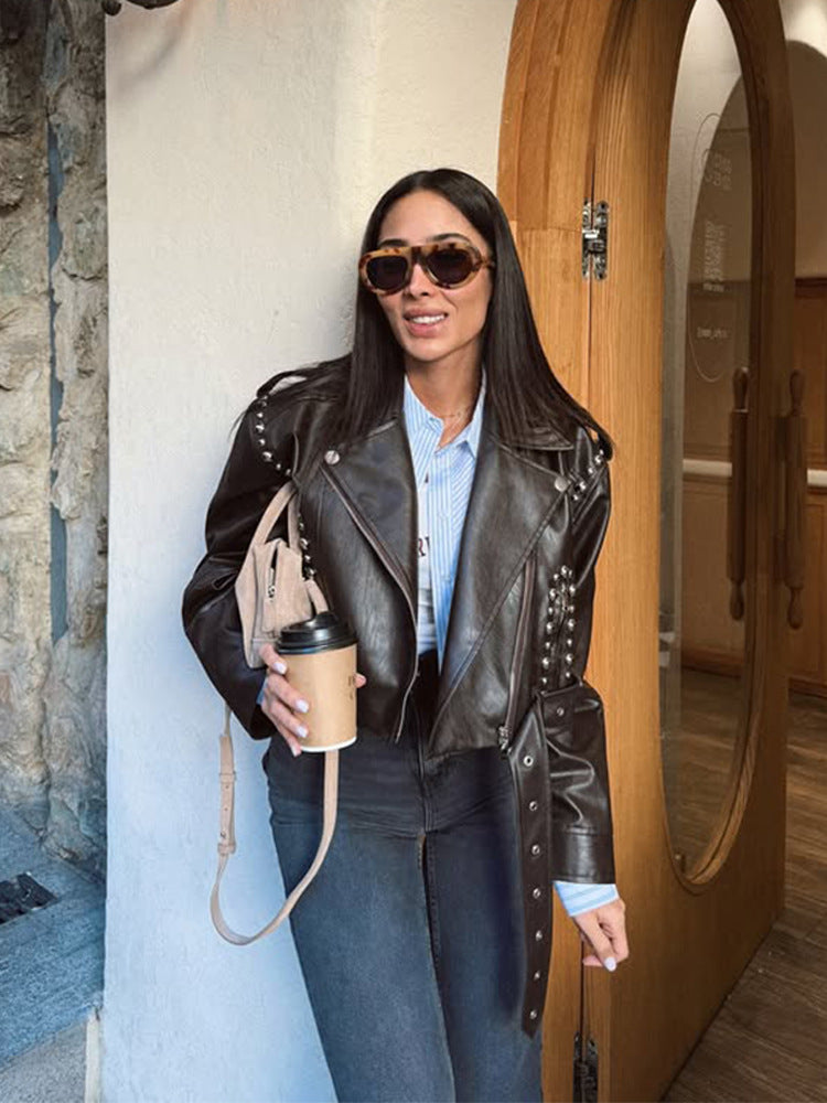 Women's Short Studded Biker Jacket Made of Faux Leather with Waist Belt Mune Fashion