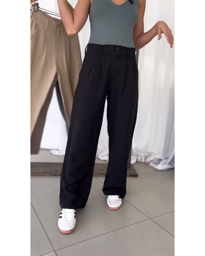 Ladies nan elegant sack-inspired pleated trousers with a high waist fit, straight wide leg, and side pockets Mune Fashion