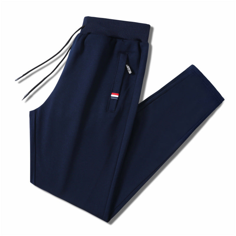 Men's Slim-Fit Jogging Pants with Elastic Ribbed Waistband, Drawstring and Zipper Pockets Mune Fashion