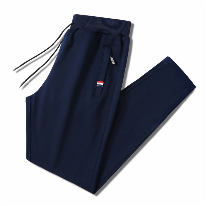 Men's Slim-Fit Jogging Pants with Elastic Ribbed Waistband, Drawstring and Zipper Pockets Mune Fashion