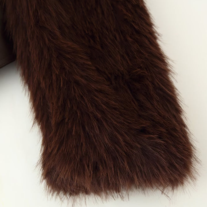 Women short jacket made of faux leather with long faux fur sleeves and tie belt Mune Fashion