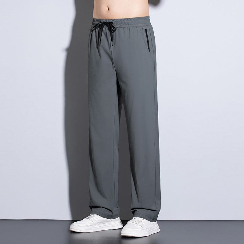 Men's sporty training pants with elastic waistband and practical pockets Mune Fashion
