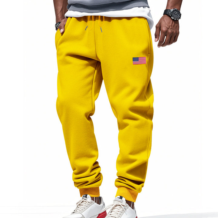 Men's slim-fit sweatpants with tapered leg, elastic drawstring waistband, and discreet flag application Mune Fashion