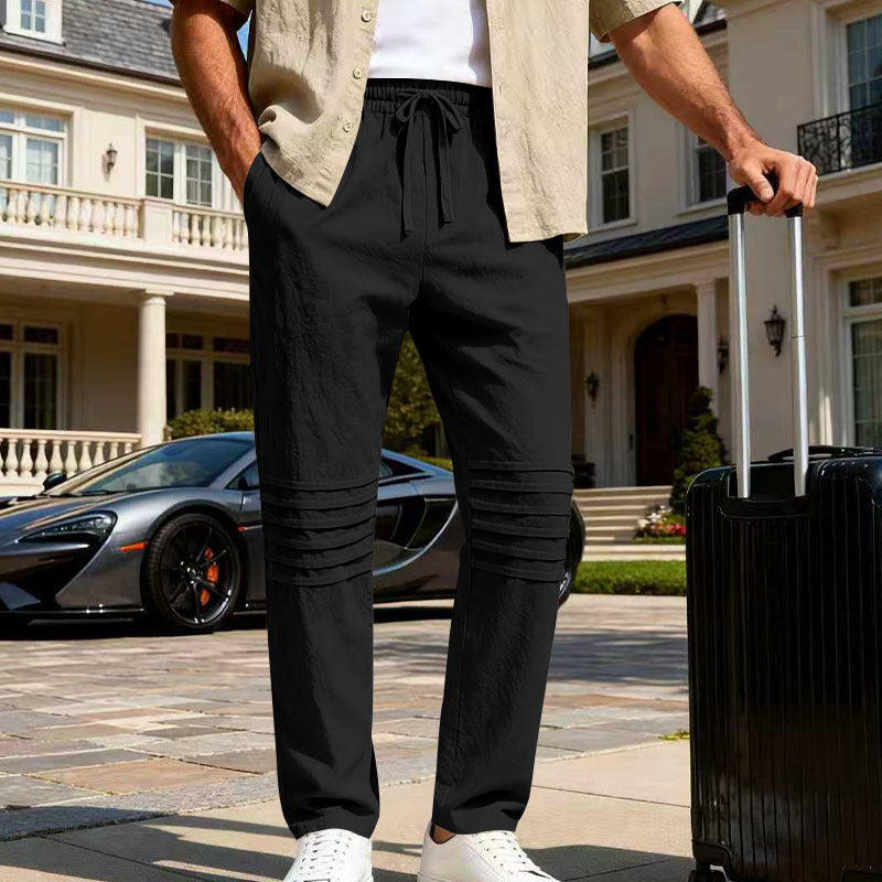 Men's relaxed linen jogging pants with elastic drawstring, pleated knee area, and side pockets Mune Fashion