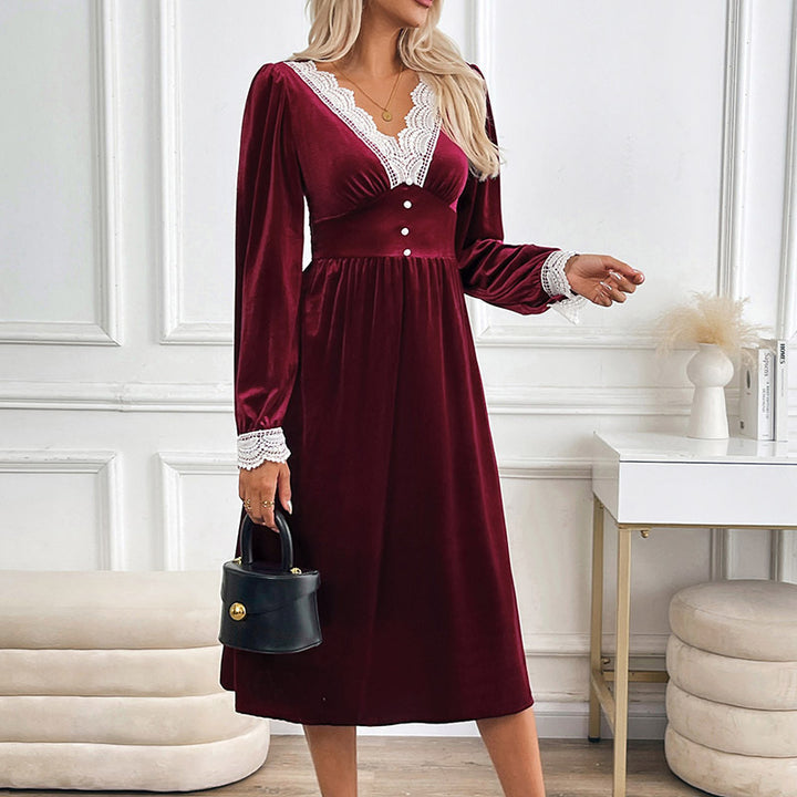 Women's velvet midi dress with lace decoration, V neckline and fitted empire silhouette.